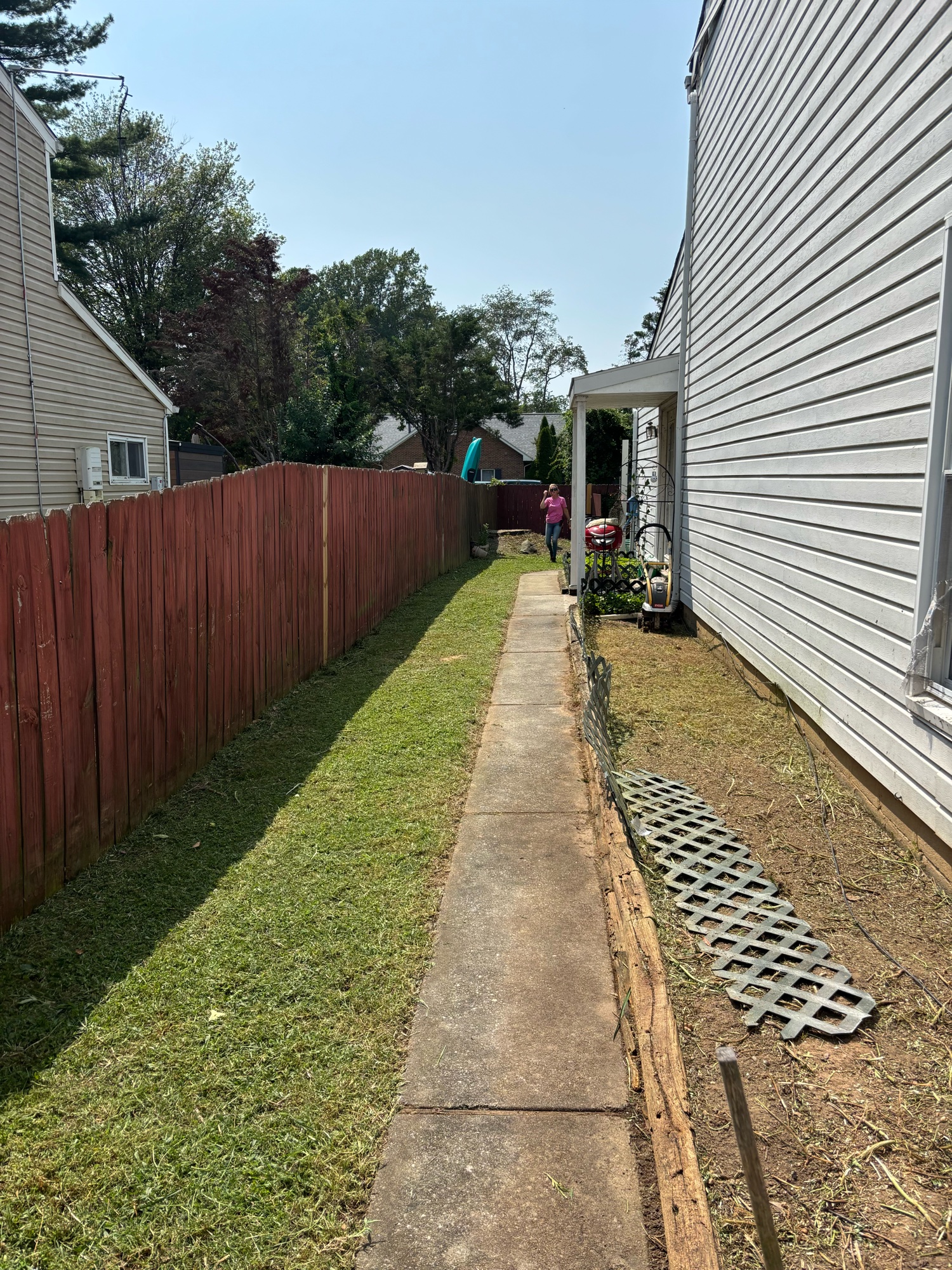 Deck area + lawn — mowing + trim + cleanup